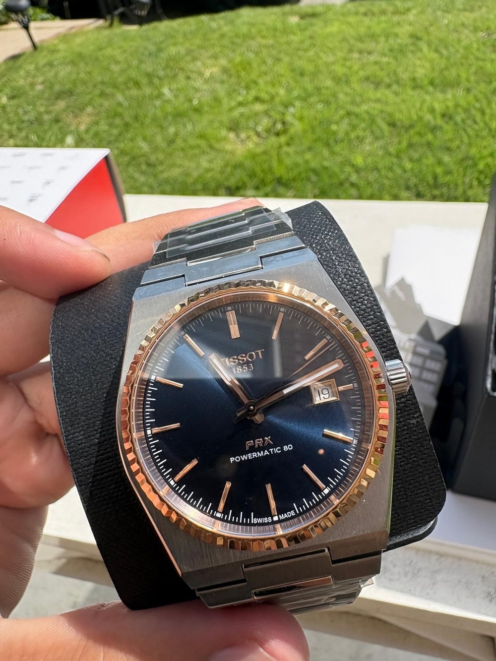 Tissot PRX Powermatic 80 with an 18K gold fluted bezel